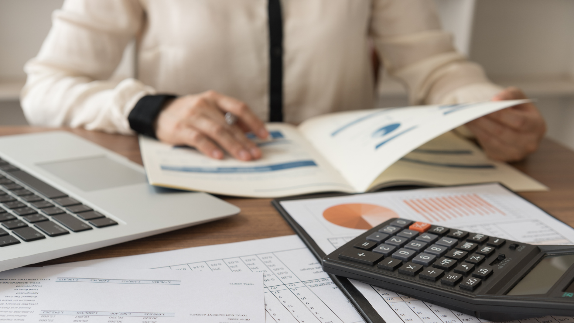 bookkeeper checking financial records